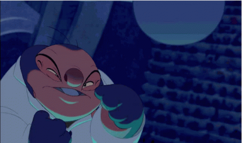 Cartoon Character In White Coat And Blue Glove GIF