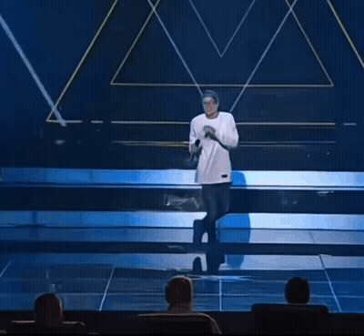 Cartoon Character In White Shirt And Blue Shorts GIF
