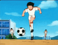 Cartoon Character Kicking Soccer Ball GIF