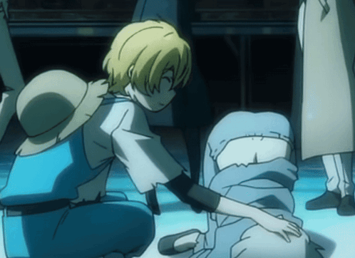 Cartoon Character Kneeling Next To Person In Blue Blanket GIF