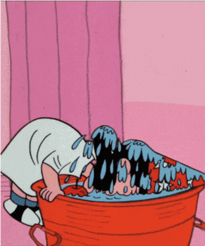 Cartoon Character Laying In Bucket Of Liquid GIF