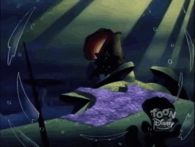 Cartoon Character Laying In Water With Purple Blanket GIF