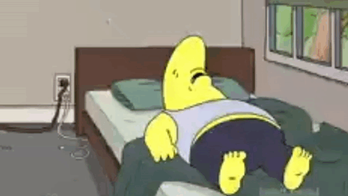 Cartoon Character Laying On Bed GIF