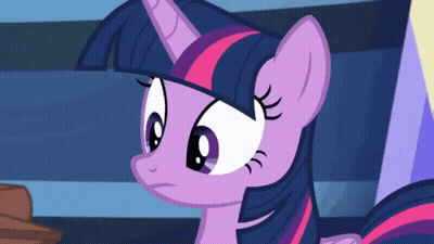 Cartoon Character Laying On Blue Blanket With Triangles GIF