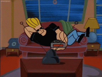 Cartoon Character Laying On Couch Watching TV GIF