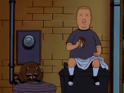 Cartoon Character Laying On Couch With Popcorn GIF