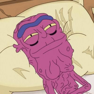 Cartoon Character Laying On Pillow With Sleep Mask GIF