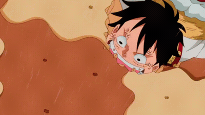 Cartoon Character Laying With Head In Mud GIF