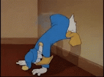 Cartoon Character Leaning Against Wall With Head In Hole GIF
