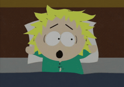 Cartoon Character Lying In Bed With Mouth Open GIF
