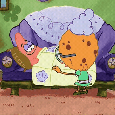 Cartoon Character Lying On Couch With Cookie GIF