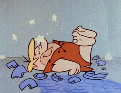 Cartoon Character Lying On Ground Surrounded By Broken Glass GIF