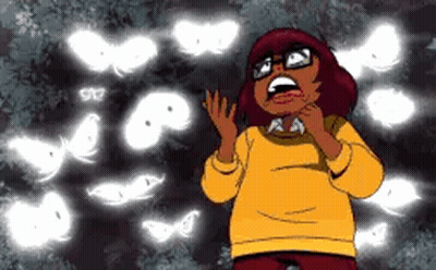 Cartoon Character Making Funny Face In Front Of Ghosts GIF