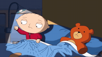 Cartoon Character Next To Teddy Bear GIF