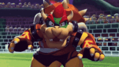 Cartoon Character On Soccer Field In Front Of Brick Wall GIF
