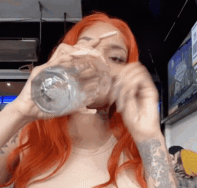 Cartoon Character Red Hair Green Eyes Covering Mouth GIF