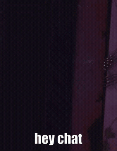 Cartoon Character Saying Hey Chat In Dark Room GIF
