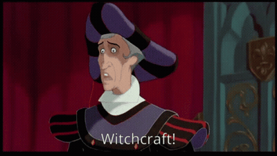 Cartoon Character Saying Witchcraft In Front Of Curtain GIF