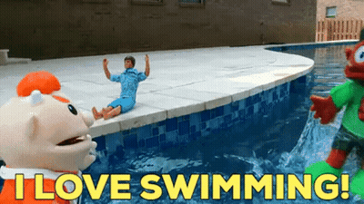 Cartoon Character Says I Love Swimming In Front Of Pool GIF