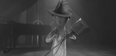 Cartoon Character Singing Into Microphone With Hat GIF