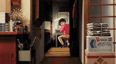 Cartoon Character Sitting at Desk Next to Xenon Box