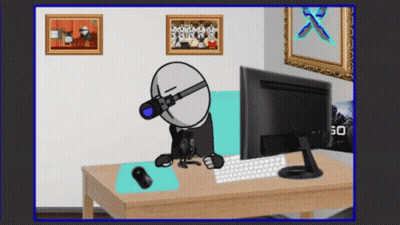 Cartoon Character Sitting at Desk With Computer Monitor and Keyboard