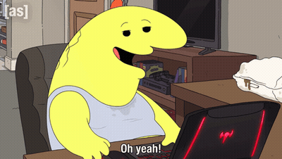 Cartoon Character Sitting At Desk With Laptop GIF