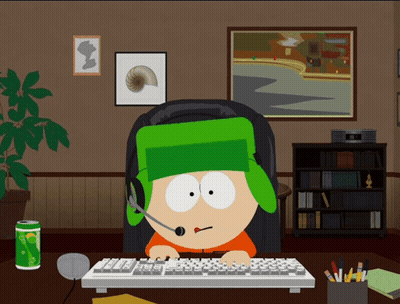 Cartoon Character Sitting At Desk With Sprite And Keyboard GIF