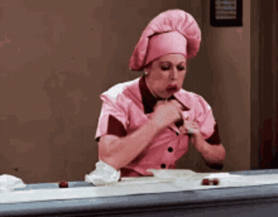 Cartoon Character Sitting In Chair With Sweet Chocolate GIF