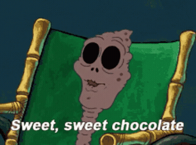 Cartoon Character Sitting In Chair With Sweet Sweet Chocolate GIF