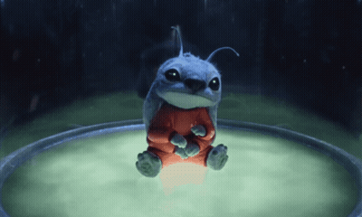 Cartoon Character Sitting In Circle In Red Shirt GIF