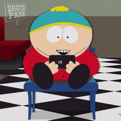 Cartoon Character Sitting In Front Of South Park Sign GIF