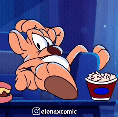 Cartoon Character Sitting Next To Popcorn GIF
