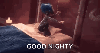 Cartoon Character Sitting On Bed Saying Good Night GIF