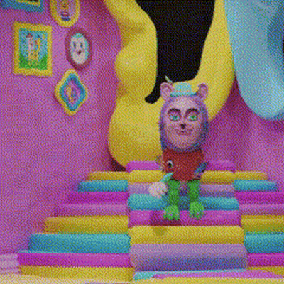 Cartoon Character Sitting On Colorful Stairs GIF