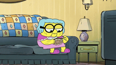 Cartoon Character Sitting On Couch Eating GIF