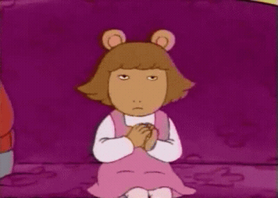 Cartoon Character Sitting On Purple Couch GIF