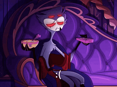 Cartoon Character Sitting On Purple Couch Holding Cereal GIF