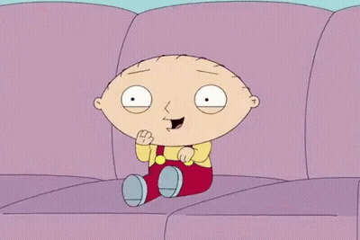 Cartoon Character Sitting On Purple Couch GIF