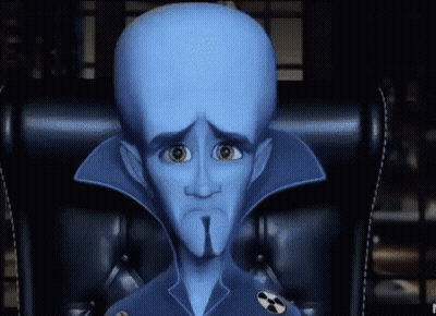 Cartoon Character Sitting With Nuclear Symbol GIF