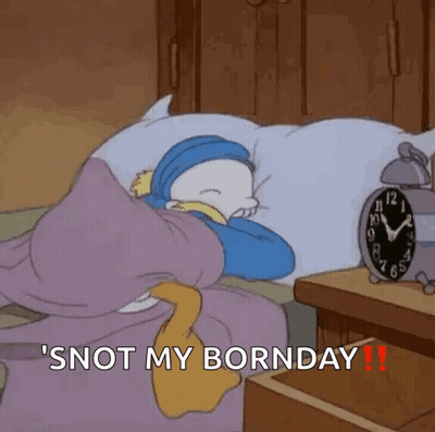 Cartoon Character Sleeping Next To Alarm Clock GIF