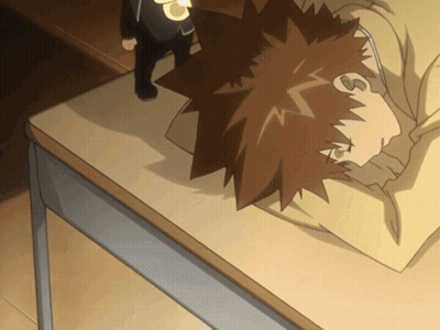 Cartoon Character Sleeping On Desk With Headphones GIF
