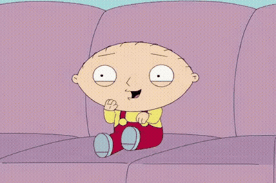 Cartoon Character Smiling On Purple Couch GIF