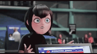 Cartoon Character Standing Before Computer Saying International Airways GIF