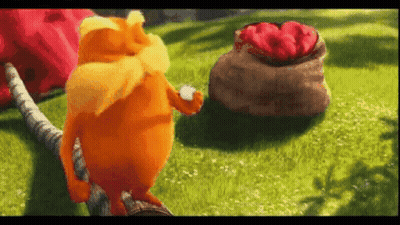 Cartoon Character Standing In Field With Bag Of Flowers GIF