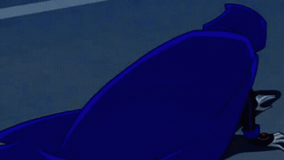 Cartoon Character Standing In Front Of City Building At Night GIF