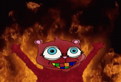 Cartoon Character Standing In Front Of Flames GIF