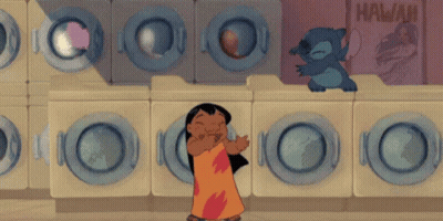 Cartoon Character Standing In Front Of Hawaii Laundromat GIF