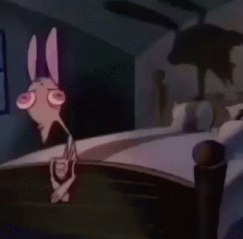 Cartoon Character Standing On Bed In Dark Room GIF