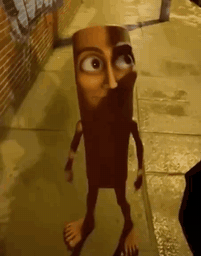 Cartoon Character Standing On Sidewalk With Legs Crossed GIF